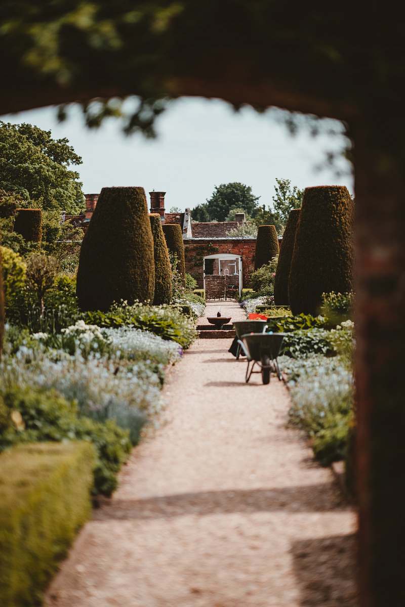 national trust - mottisfont brown walkway beside green grass garden romsey